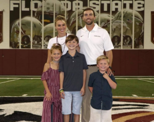 Kendal Briles and his wife, Sarah Briles, with their kids.