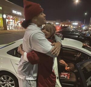 Cameron Latu with his mother