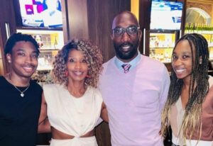 Ike Reese with his wife and children
