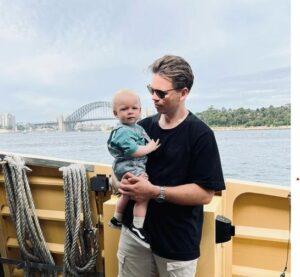 Michael Bracewell with his child