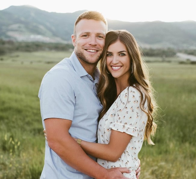 Taysom Hill and his wife