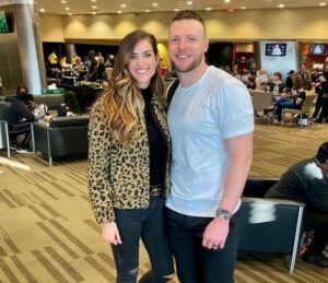 Taysom Hill with his wife 
