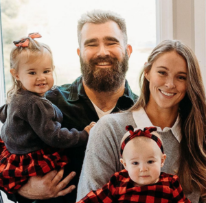 The couple Jason Kelce and Kylie McDevitt Kelce with their children