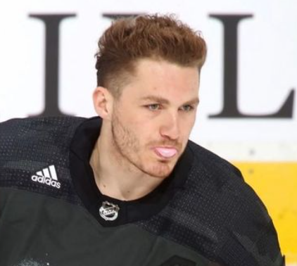 Connor McDavid's response to Matthew Tkachuk's punches during the